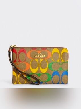 Coach Corner Zip Wristlet in the Rainbow Signature Canvas EUC